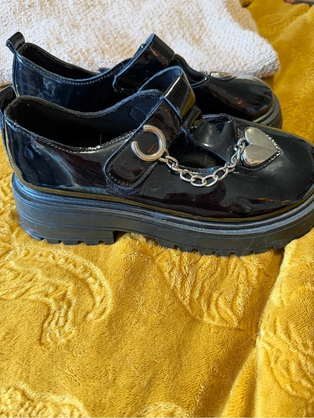 MIA Black Patent Platform Mary Janes with Silver Heart Charm